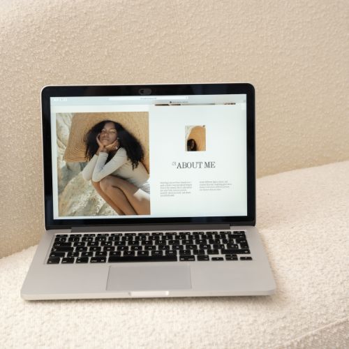 Open laptop shows a website with good image optimisation.